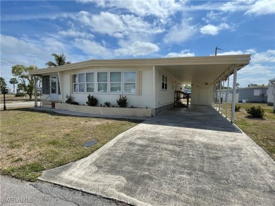 Welcome to your happy new home! This super cute house it sits on on Riverbend Golf and Country Club in Florida - for sale on GolfHomes.com, golf home, golf lot
