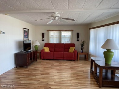 Welcome to your happy new home! This super cute house it sits on on Riverbend Golf and Country Club in Florida - for sale on GolfHomes.com, golf home, golf lot