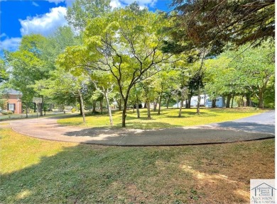 Picture this: It's Saturday morning and you're enjoying the on Chatmoss Country Club in Virginia - for sale on GolfHomes.com, golf home, golf lot