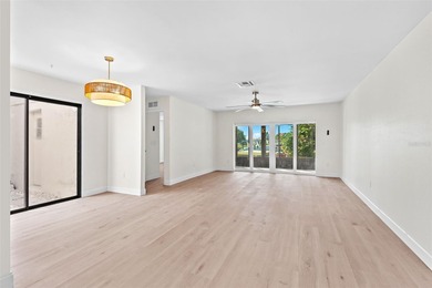 Welcome to 4448 Marine Parkway - Your Waterfront Dream Home on Gulf Harbors Golf Course in Florida - for sale on GolfHomes.com, golf home, golf lot