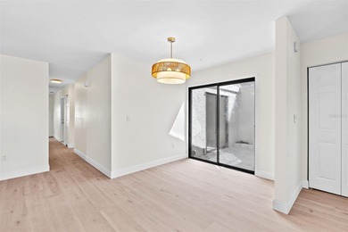 Welcome to 4448 Marine Parkway - Your Waterfront Dream Home on Gulf Harbors Golf Course in Florida - for sale on GolfHomes.com, golf home, golf lot