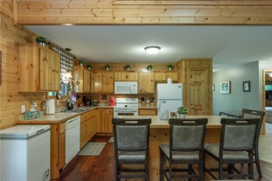 Discover the perfect blend of rustic charm and modern comfort in on Hardwoods Golf Club At Mille Lacs in Minnesota - for sale on GolfHomes.com, golf home, golf lot