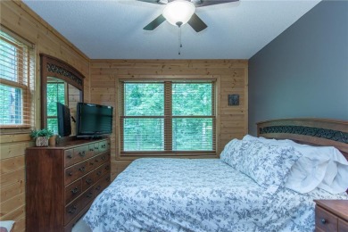 Discover the perfect blend of rustic charm and modern comfort in on Hardwoods Golf Club At Mille Lacs in Minnesota - for sale on GolfHomes.com, golf home, golf lot