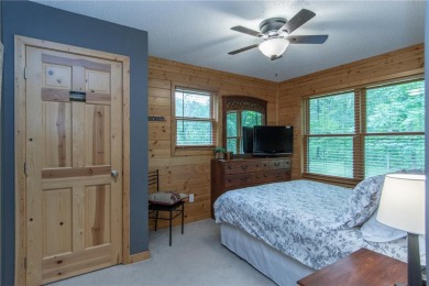 Discover the perfect blend of rustic charm and modern comfort in on Hardwoods Golf Club At Mille Lacs in Minnesota - for sale on GolfHomes.com, golf home, golf lot