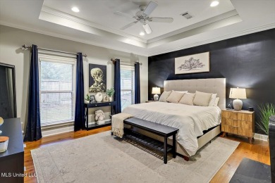 Come see this beautiful and spacious home nestled inside the on Lake Caroline Golf Club in Mississippi - for sale on GolfHomes.com, golf home, golf lot