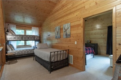 Discover the perfect blend of rustic charm and modern comfort in on Hardwoods Golf Club At Mille Lacs in Minnesota - for sale on GolfHomes.com, golf home, golf lot