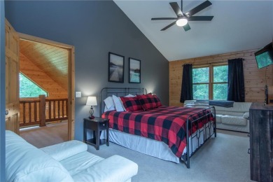 Discover the perfect blend of rustic charm and modern comfort in on Hardwoods Golf Club At Mille Lacs in Minnesota - for sale on GolfHomes.com, golf home, golf lot