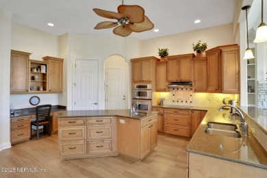 Discover luxury living in this meticulously maintained 3-bedroom on King and Bear Golf Course/World Golf Village in Florida - for sale on GolfHomes.com, golf home, golf lot