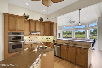 Discover luxury living in this meticulously maintained 3-bedroom on King and Bear Golf Course/World Golf Village in Florida - for sale on GolfHomes.com, golf home, golf lot