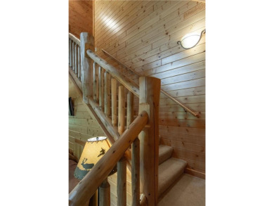 Discover the perfect blend of rustic charm and modern comfort in on Hardwoods Golf Club At Mille Lacs in Minnesota - for sale on GolfHomes.com, golf home, golf lot