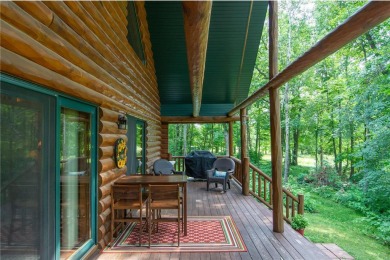 Discover the perfect blend of rustic charm and modern comfort in on Hardwoods Golf Club At Mille Lacs in Minnesota - for sale on GolfHomes.com, golf home, golf lot