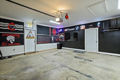 Come see this beautiful and spacious home nestled inside the on Lake Caroline Golf Club in Mississippi - for sale on GolfHomes.com, golf home, golf lot