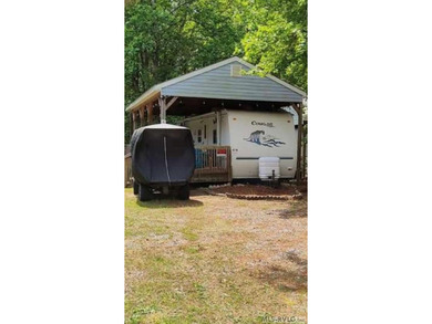 Escape to relaxation with this cozy camper retreat! Nestled in a on River Ridge Golf Club in Virginia - for sale on GolfHomes.com, golf home, golf lot
