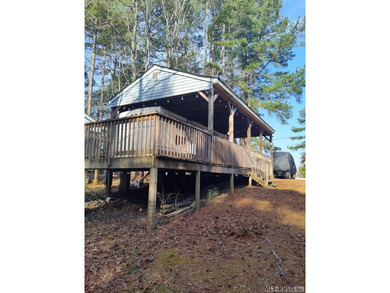 Escape to relaxation with this cozy camper retreat! Nestled in a on River Ridge Golf Club in Virginia - for sale on GolfHomes.com, golf home, golf lot