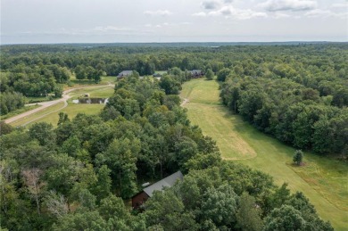 Discover the perfect blend of rustic charm and modern comfort in on Hardwoods Golf Club At Mille Lacs in Minnesota - for sale on GolfHomes.com, golf home, golf lot