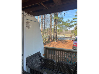 Escape to relaxation with this cozy camper retreat! Nestled in a on River Ridge Golf Club in Virginia - for sale on GolfHomes.com, golf home, golf lot