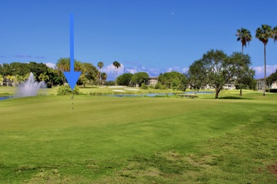 2/2 CONDO NESTLED ON THE WATER WITH LIGHTED FOUNTAIN GOLF VIEWS! on Wynmoor Golf Course in Florida - for sale on GolfHomes.com, golf home, golf lot