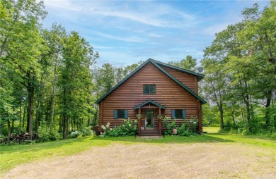 Discover the perfect blend of rustic charm and modern comfort in on Hardwoods Golf Club At Mille Lacs in Minnesota - for sale on GolfHomes.com, golf home, golf lot