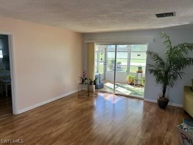 ***SELLER WILL REPAINT CORAL ACCENT WALL AT BUYER'S REQUEST*** on Myerlee Country Club in Florida - for sale on GolfHomes.com, golf home, golf lot