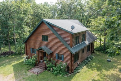 Discover the perfect blend of rustic charm and modern comfort in on Hardwoods Golf Club At Mille Lacs in Minnesota - for sale on GolfHomes.com, golf home, golf lot