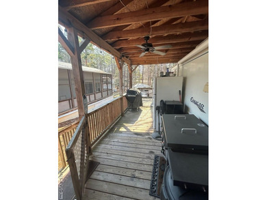 Escape to relaxation with this cozy camper retreat! Nestled in a on River Ridge Golf Club in Virginia - for sale on GolfHomes.com, golf home, golf lot