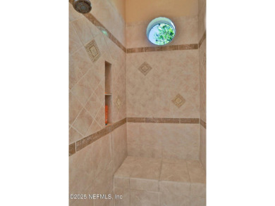 Discover luxury living in this meticulously maintained 3-bedroom on King and Bear Golf Course/World Golf Village in Florida - for sale on GolfHomes.com, golf home, golf lot
