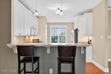 You'll love coming home to this well built, well maintained on Harbour Point Golf Club in North Carolina - for sale on GolfHomes.com, golf home, golf lot