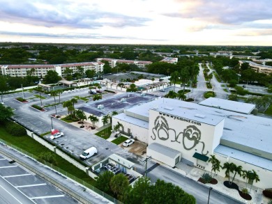 2/2 CONDO NESTLED ON THE WATER WITH LIGHTED FOUNTAIN GOLF VIEWS! on Wynmoor Golf Course in Florida - for sale on GolfHomes.com, golf home, golf lot