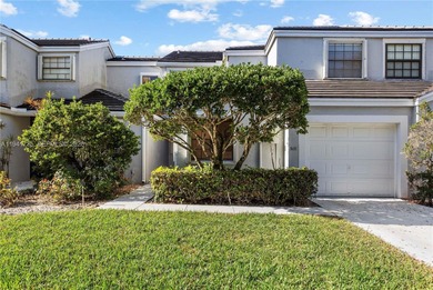 This spacious well maintained 3-bedroom, 2.5-bath townhome with on Woodmont Country Club in Florida - for sale on GolfHomes.com, golf home, golf lot