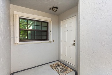 This spacious well maintained 3-bedroom, 2.5-bath townhome with on Woodmont Country Club in Florida - for sale on GolfHomes.com, golf home, golf lot