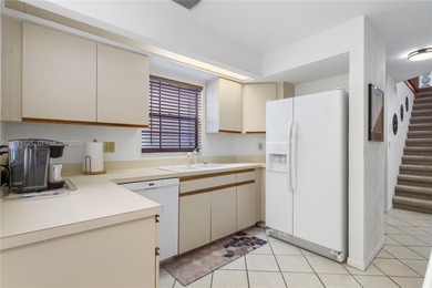 This spacious well maintained 3-bedroom, 2.5-bath townhome with on Woodmont Country Club in Florida - for sale on GolfHomes.com, golf home, golf lot