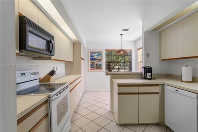 This spacious well maintained 3-bedroom, 2.5-bath townhome with on Woodmont Country Club in Florida - for sale on GolfHomes.com, golf home, golf lot