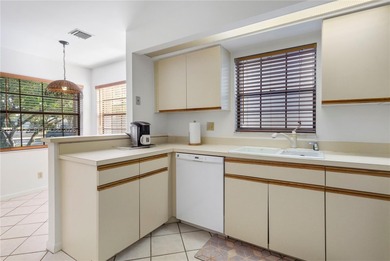 This spacious well maintained 3-bedroom, 2.5-bath townhome with on Woodmont Country Club in Florida - for sale on GolfHomes.com, golf home, golf lot