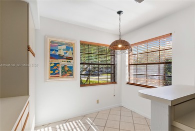 This spacious well maintained 3-bedroom, 2.5-bath townhome with on Woodmont Country Club in Florida - for sale on GolfHomes.com, golf home, golf lot
