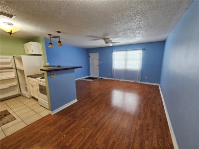 This 3rd floor unit is located in the beautiful 55+ Zephyr on Zephyrhills Municipal Golf Course in Florida - for sale on GolfHomes.com, golf home, golf lot