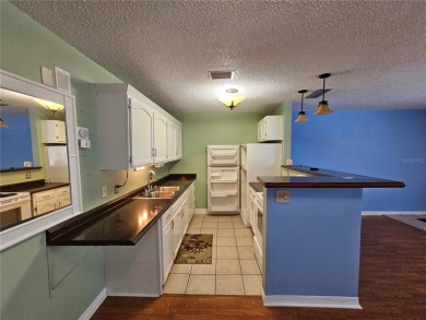 This 3rd floor unit is located in the beautiful 55+ Zephyr on Zephyrhills Municipal Golf Course in Florida - for sale on GolfHomes.com, golf home, golf lot