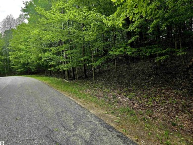 Nicely mature, wooded 1.07 acre lot in a quiet subdivision on A-Ga-Ming Golf Resort in Michigan - for sale on GolfHomes.com, golf home, golf lot