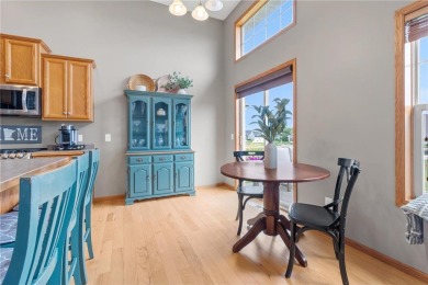 Wake up to breathtaking sunrise views over the adjacent golf on Boulder Pointe Golf Club in Minnesota - for sale on GolfHomes.com, golf home, golf lot