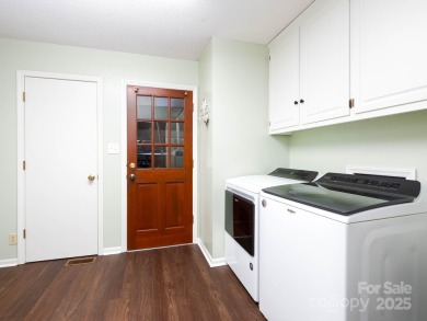 Beautifully updated three-bedroom ranch home nestled at the 14th on Westport Golf Club in North Carolina - for sale on GolfHomes.com, golf home, golf lot