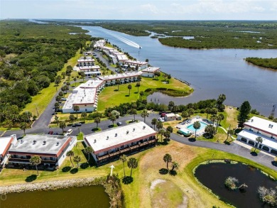 SPECTACULAR RIVERFRONT CONDO VILLA WITH BEACH, WATERWAY, POOL on Ocean Palm Golf Course in Florida - for sale on GolfHomes.com, golf home, golf lot