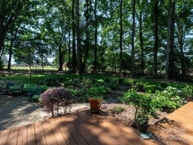 Beautifully updated three-bedroom ranch home nestled at the 14th on Westport Golf Club in North Carolina - for sale on GolfHomes.com, golf home, golf lot