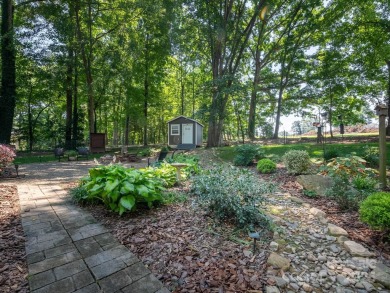 Beautifully updated three-bedroom ranch home nestled at the 14th on Westport Golf Club in North Carolina - for sale on GolfHomes.com, golf home, golf lot