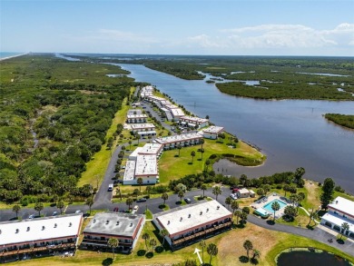 SPECTACULAR RIVERFRONT CONDO VILLA WITH BEACH, WATERWAY, POOL on Ocean Palm Golf Course in Florida - for sale on GolfHomes.com, golf home, golf lot