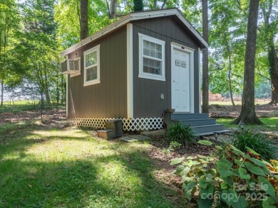 Beautifully updated three-bedroom ranch home nestled at the 14th on Westport Golf Club in North Carolina - for sale on GolfHomes.com, golf home, golf lot