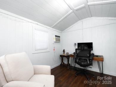 Beautifully updated three-bedroom ranch home nestled at the 14th on Westport Golf Club in North Carolina - for sale on GolfHomes.com, golf home, golf lot