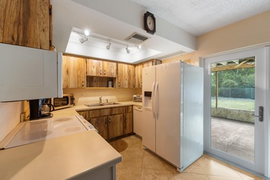 This 2 bedroom, 1 bath CBS home boasts a prime location within on McArthur Golf Club in Florida - for sale on GolfHomes.com, golf home, golf lot