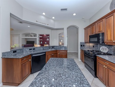 Stunning,  Ghiberti WCI built model villa offers a on Venetian Golf and River Club in Florida - for sale on GolfHomes.com, golf home, golf lot