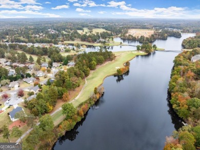 Welcome to your dream home! This stunning 4-bedroom, 4-bathroom on Mirror Lake Golf Club in Georgia - for sale on GolfHomes.com, golf home, golf lot