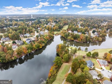 Welcome to your dream home! This stunning 4-bedroom, 4-bathroom on Mirror Lake Golf Club in Georgia - for sale on GolfHomes.com, golf home, golf lot