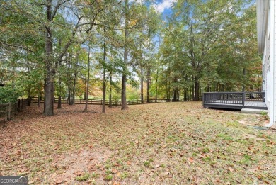 Welcome to your dream home! This stunning 4-bedroom, 4-bathroom on Mirror Lake Golf Club in Georgia - for sale on GolfHomes.com, golf home, golf lot